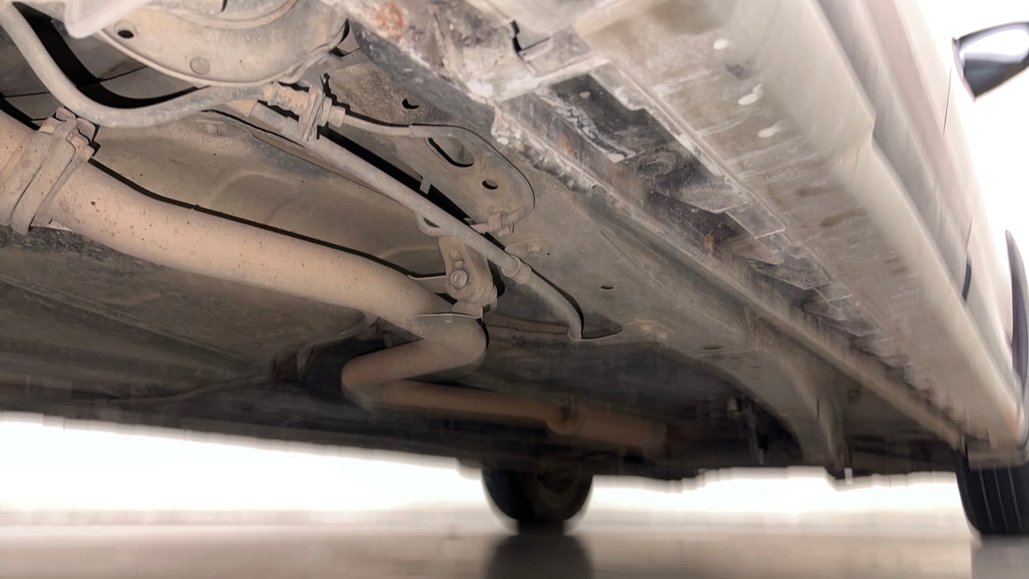 Used 2021 Maruti Suzuki XL6 Alpha MT Petrol Petrol Manual extra REAR RIGHT UNDERBODY VIEW