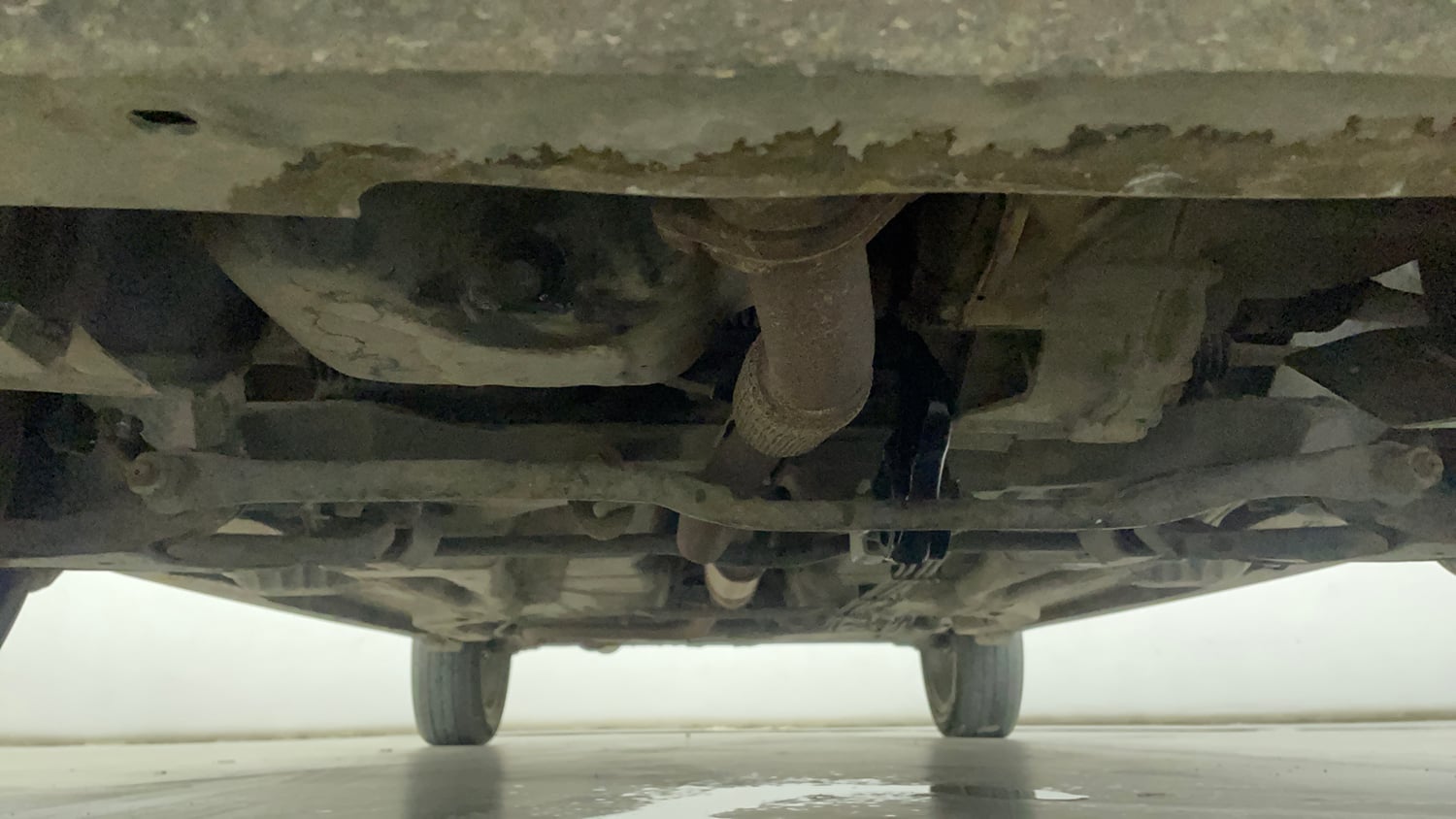 Used 2022 Tata Tigor XZ Plus Petrol Manual extra FRONT LEFT UNDERBODY VIEW