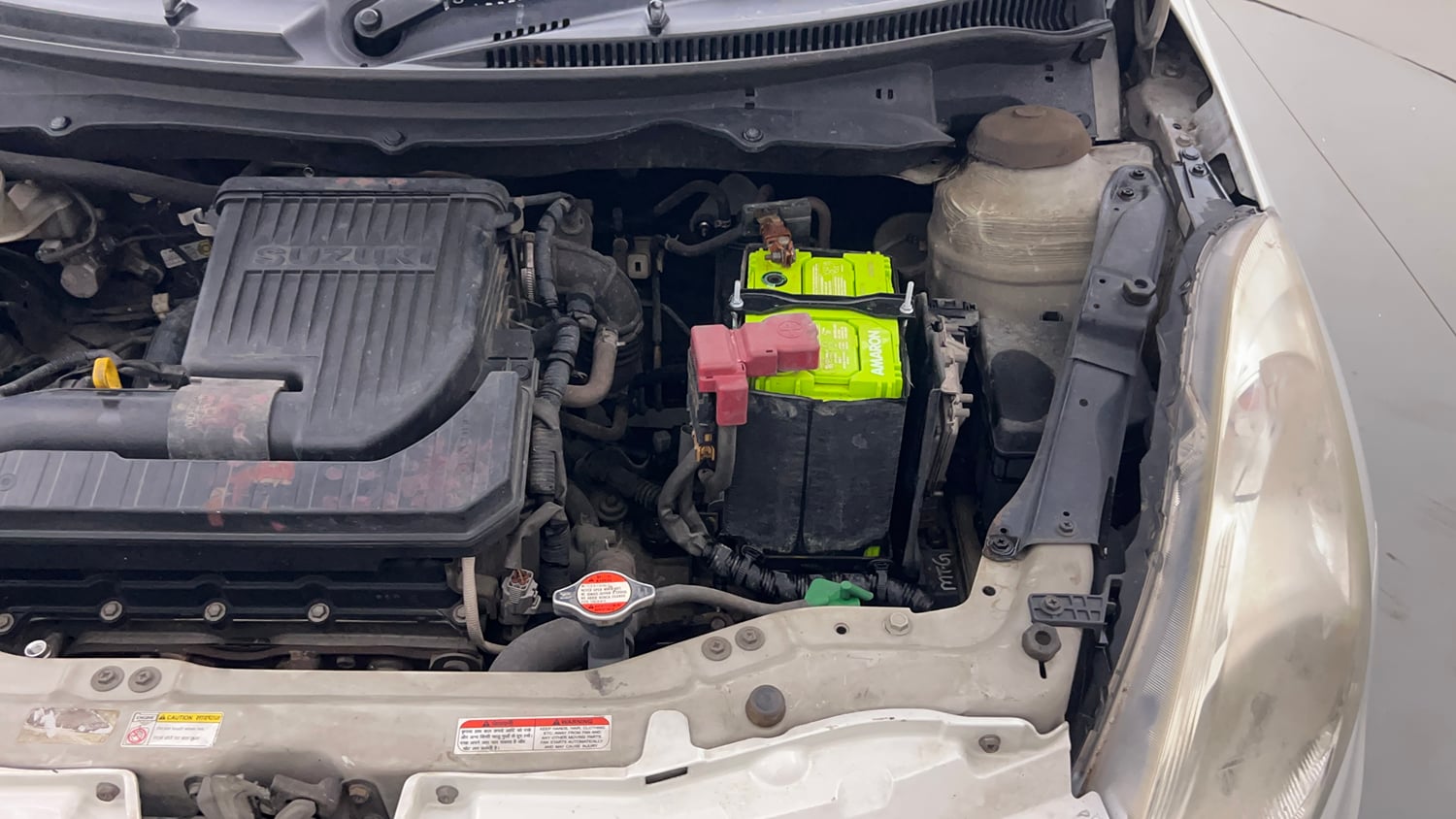 Used 2015 Maruti Suzuki Swift VXi Petrol Manual engine ENGINE LEFT SIDE HINGE & APRON VIEW