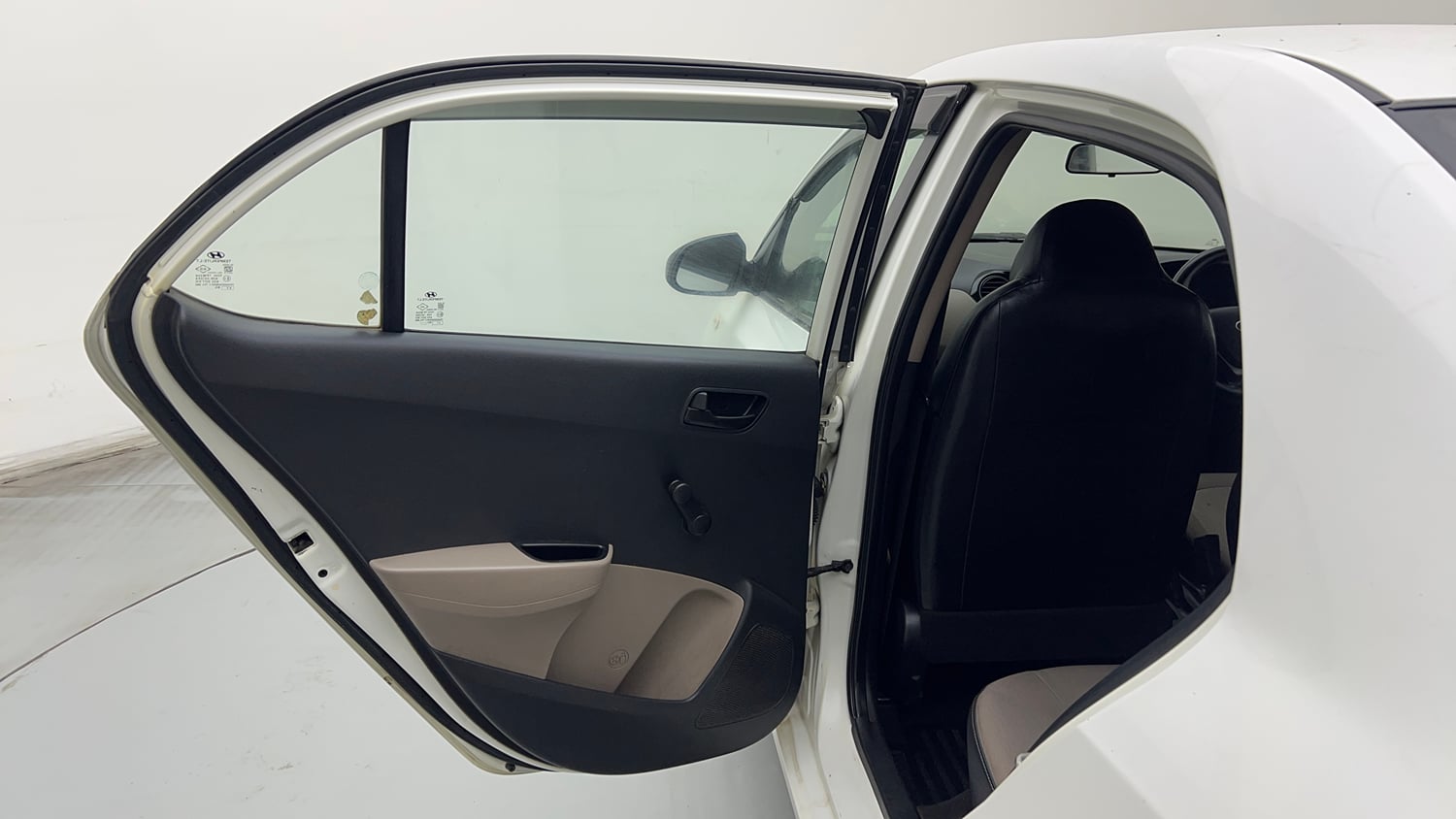 Used 2017 Hyundai Xcent Base ABS 1.2 Petrol Manual interior LEFT REAR DOOR OPEN VIEW