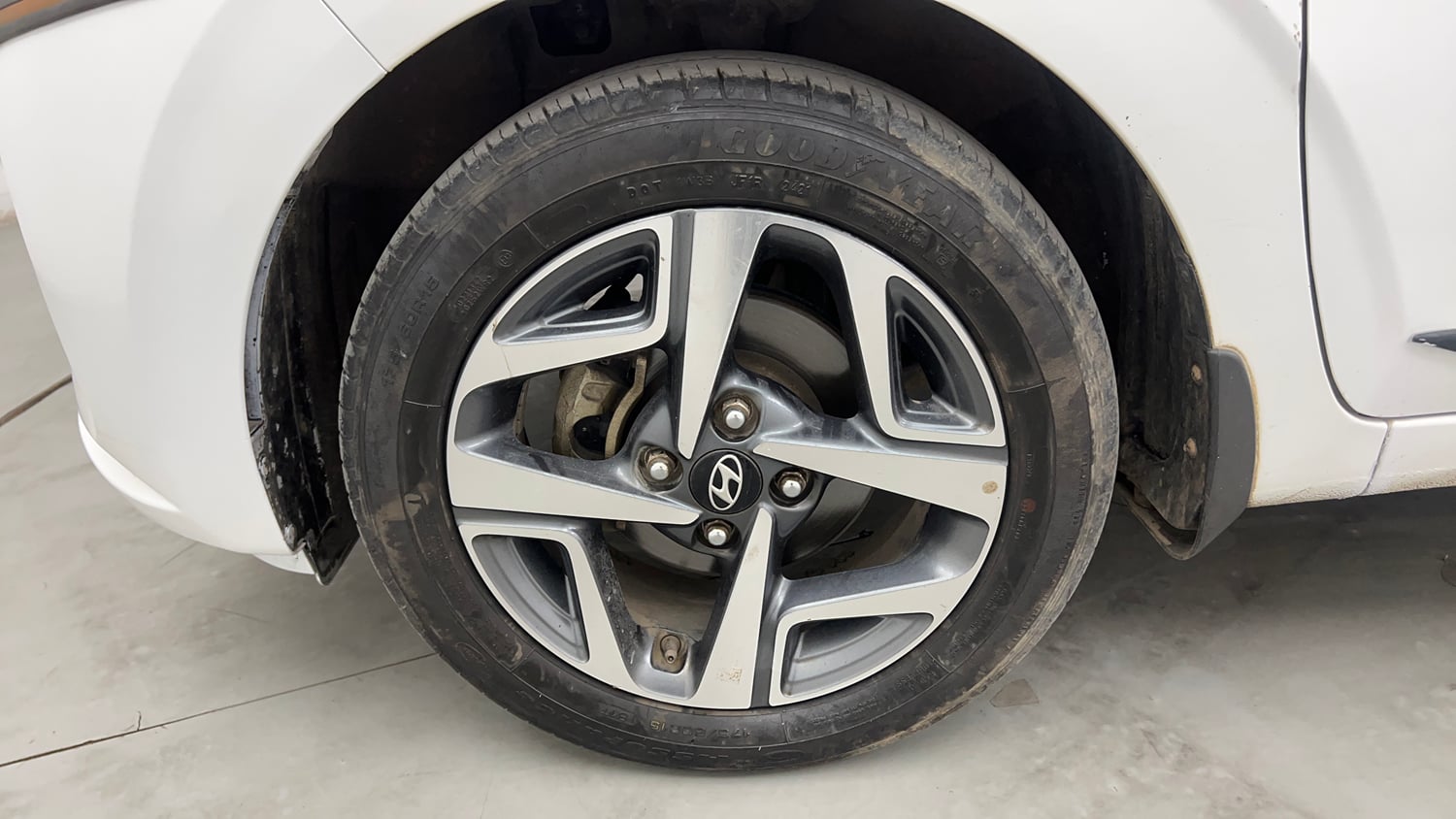 Used 2021 Hyundai Aura SX 1.2 Petrol Petrol Manual tyres LEFT FRONT TYRE RIM VIEW