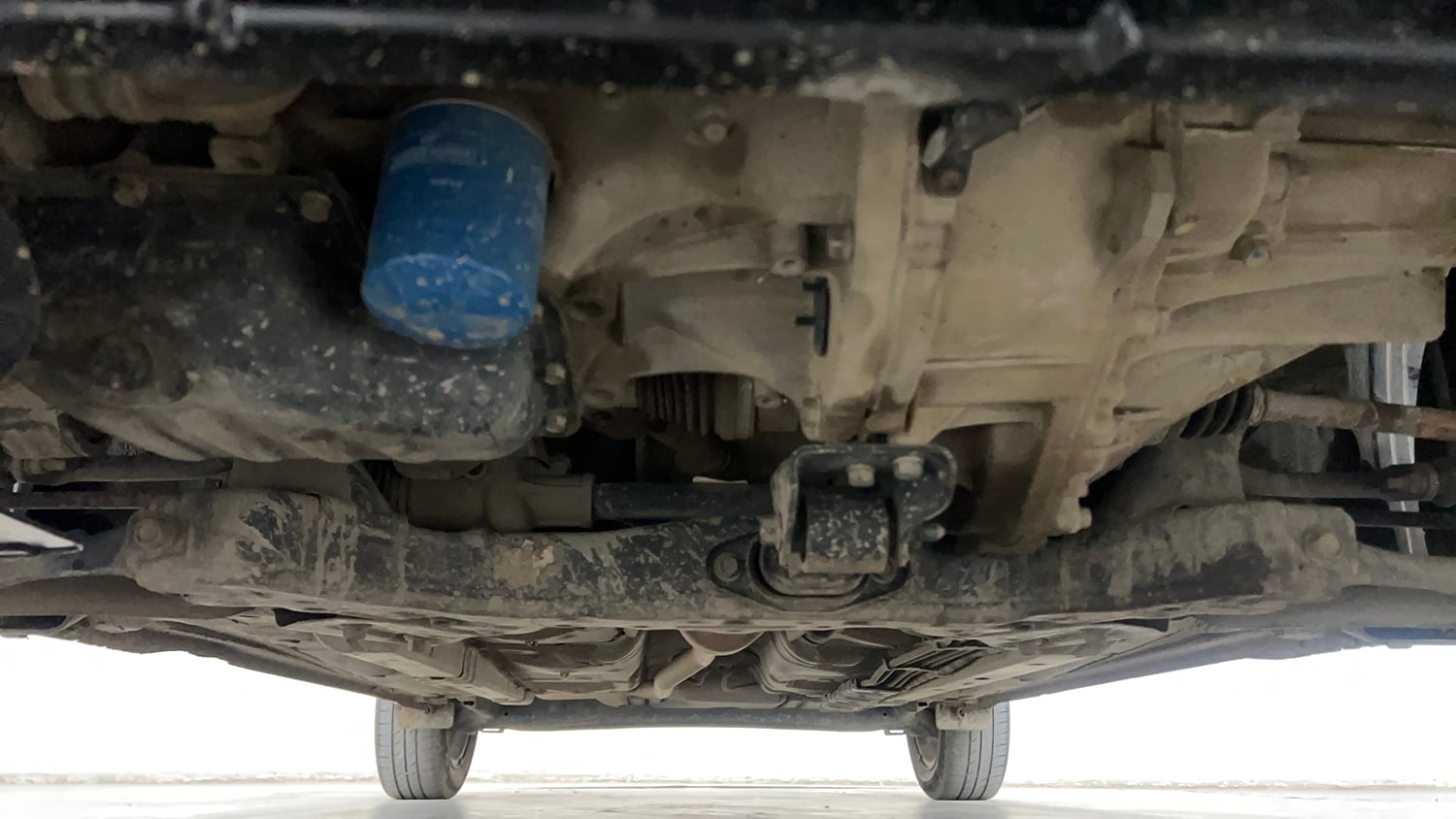 Used 2023 Hyundai Aura SX 1.2 CNG Cng Manual extra FRONT LEFT UNDERBODY VIEW