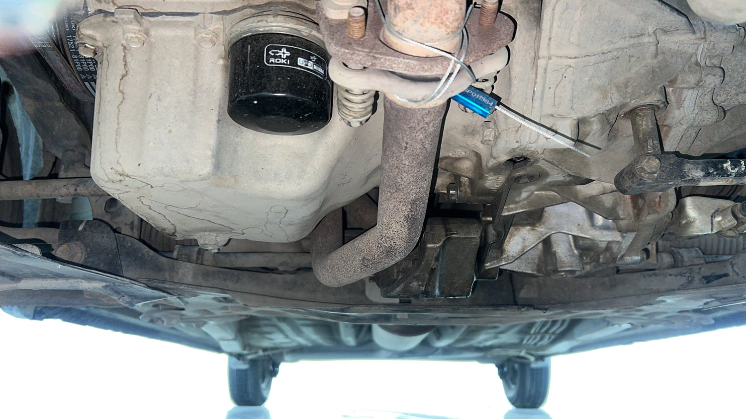 Used 2022 Maruti Suzuki Wagon R LXi (O) 1.0 CNG Cng Manual extra FRONT LEFT UNDERBODY VIEW