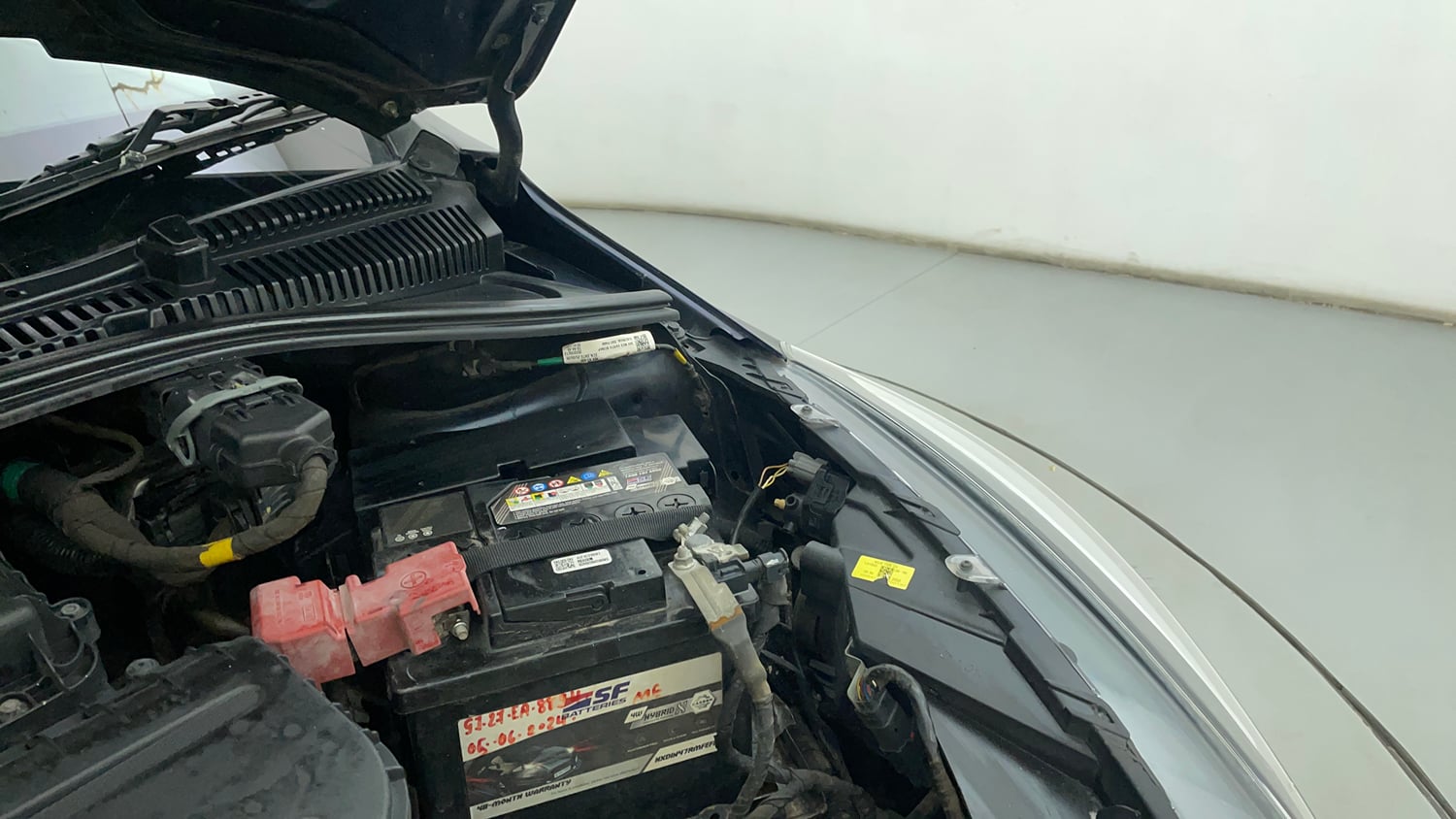Used 2022 Tata Tigor XZ Plus Petrol Manual engine ENGINE LEFT SIDE HINGE & APRON VIEW