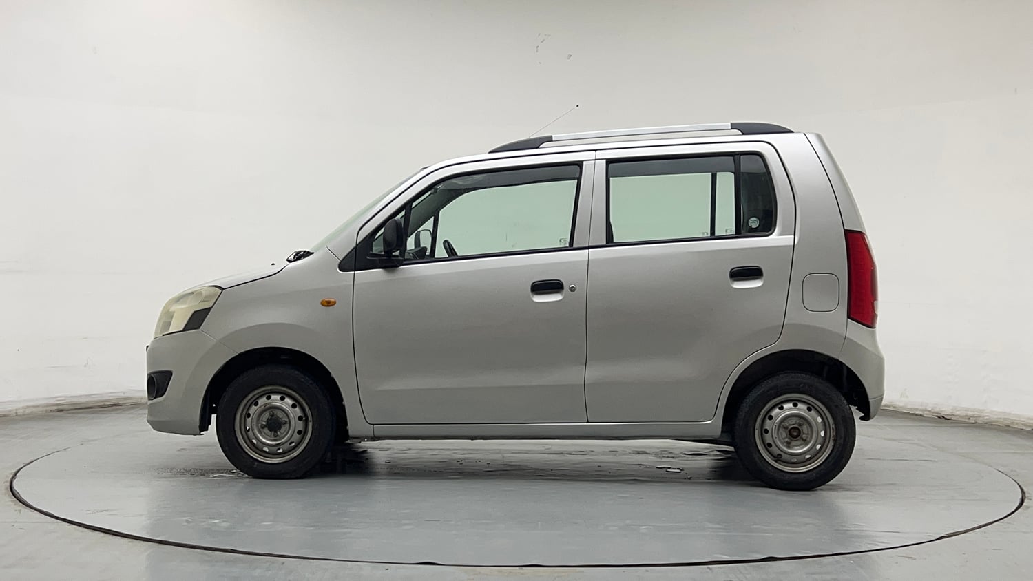 Used 2013 Maruti Suzuki Wagon R LXI Petrol Manual exterior LEFT SIDE VIEW