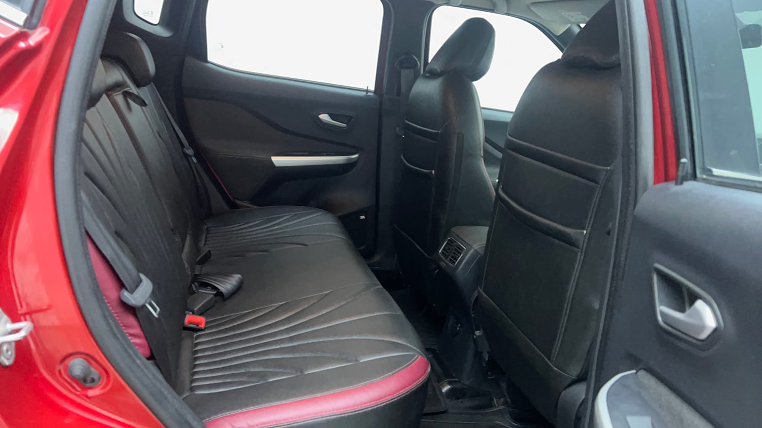 Used 2024 Nissan Magnite XV Premium Turbo CVT Dual Tone Petrol Automatic interior RIGHT SIDE REAR DOOR CABIN VIEW