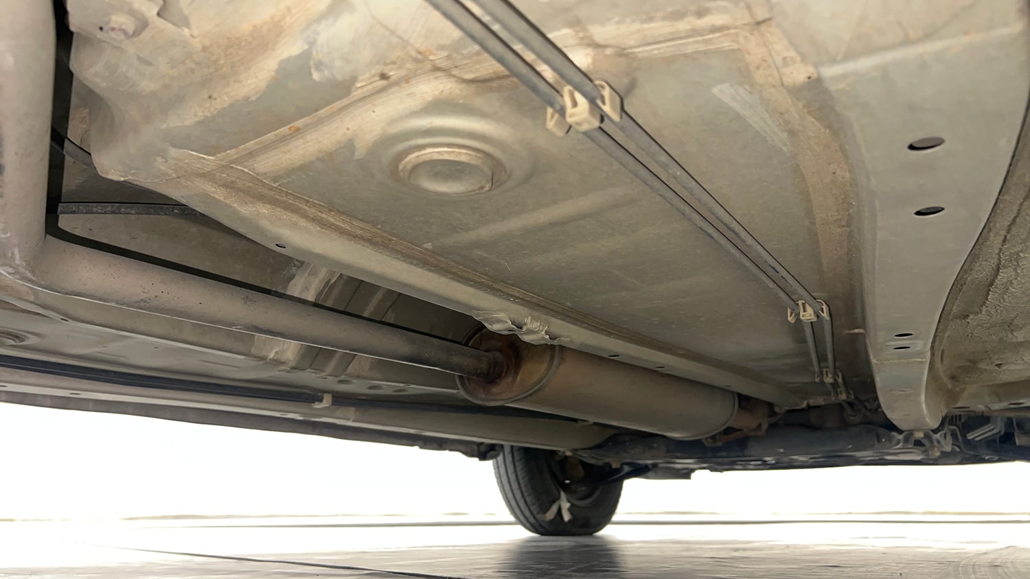 Used 2023 Maruti Suzuki Alto K10 VXi AGS Petrol Automatic extra REAR RIGHT UNDERBODY VIEW