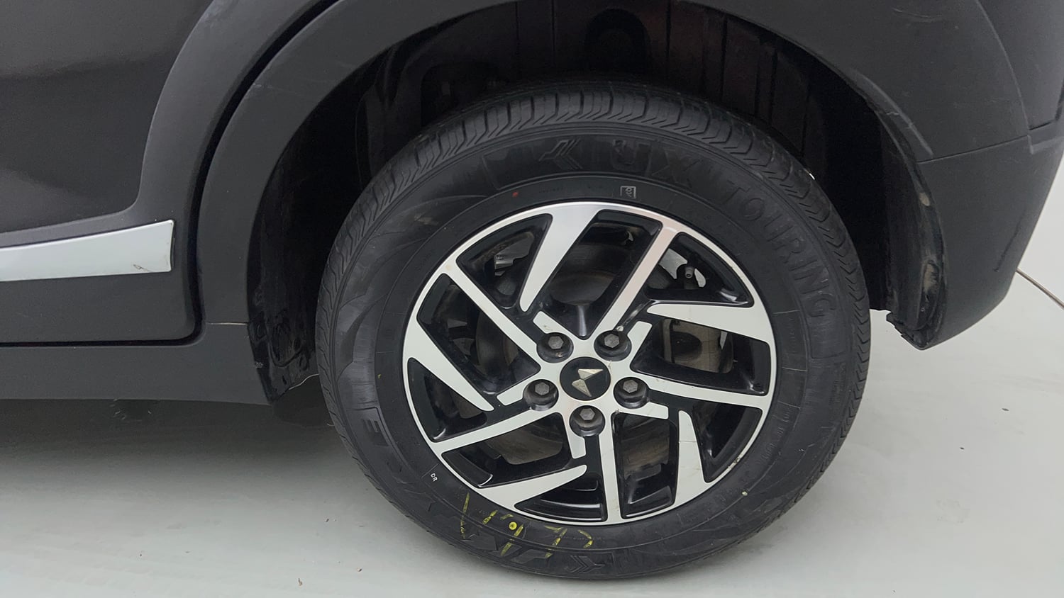 Used 2024 Mahindra XUV 3XO AX5 1.2 Petrol Petrol Manual tyres LEFT REAR TYRE RIM VIEW