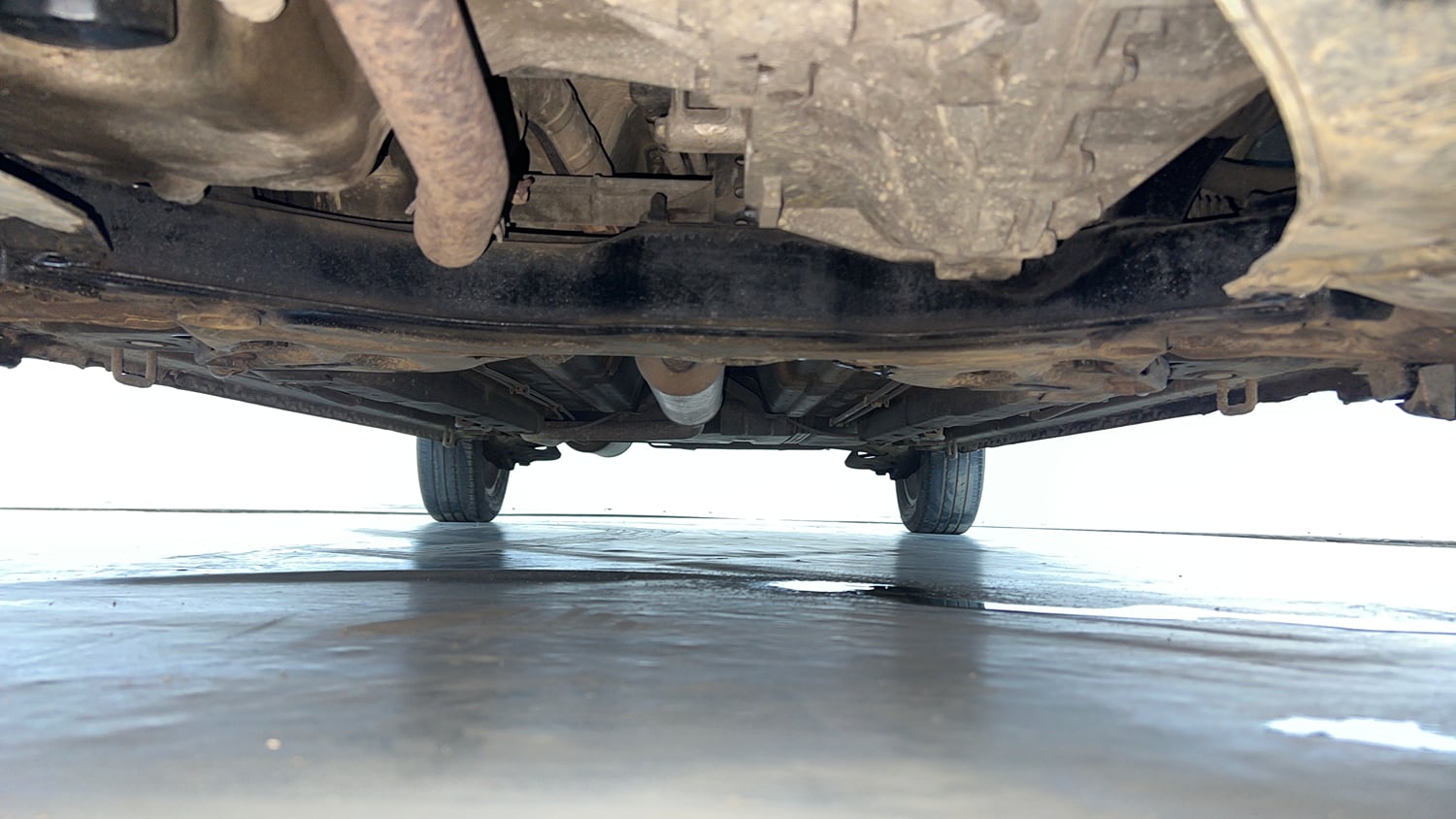 Used 2015 Maruti Suzuki Ertiga ZXi Petrol Manual extra FRONT LEFT UNDERBODY VIEW