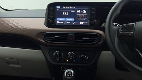 Used 2022 Hyundai Aura SX 1.2 CNG Cng Manual interior MUSIC SYSTEM & AC CONTROL VIEW