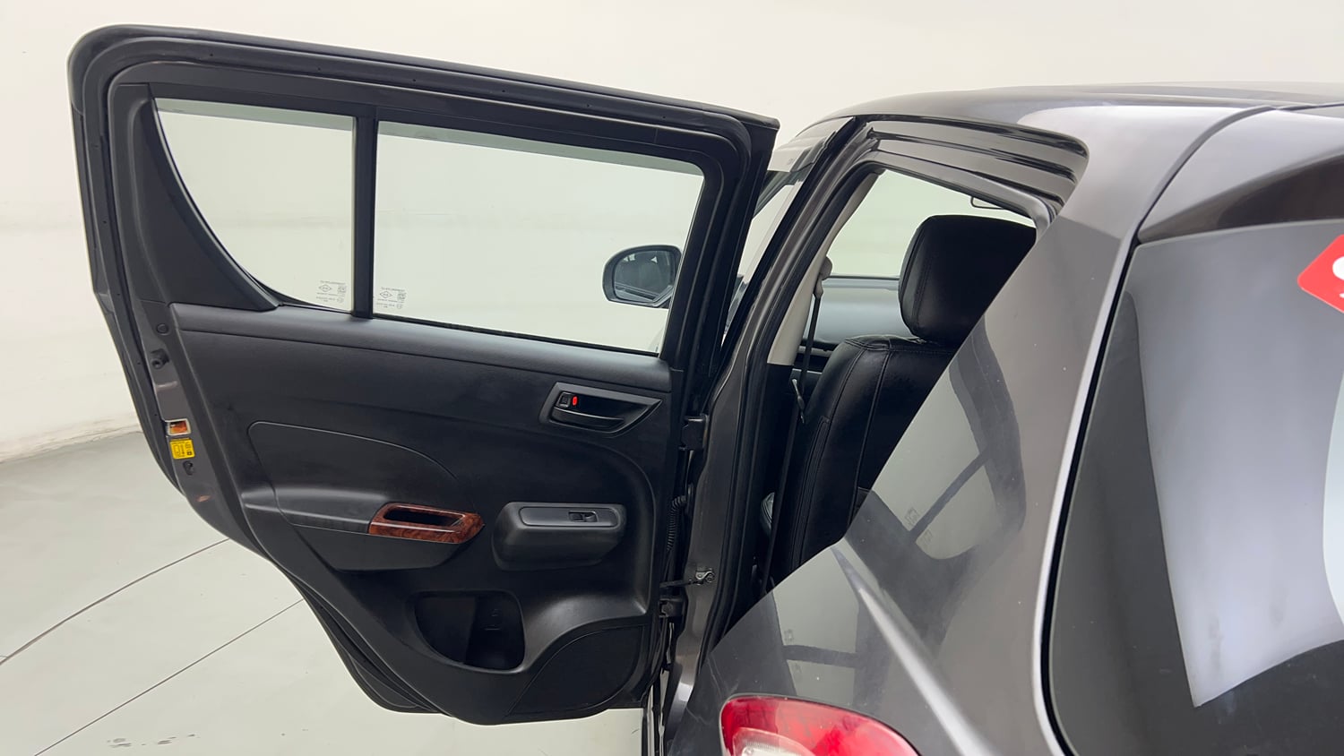 Used 2017 Maruti Suzuki Swift Lxi (O) Petrol Manual interior LEFT REAR DOOR OPEN VIEW