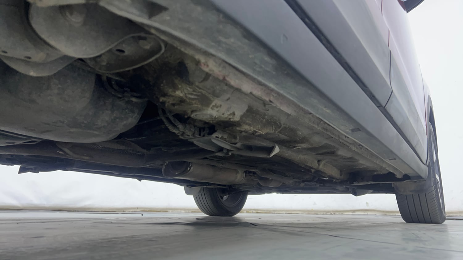 Used 2023 Volkswagen Taigun Topline 1.0 TSI MT Petrol Manual extra REAR RIGHT UNDERBODY VIEW