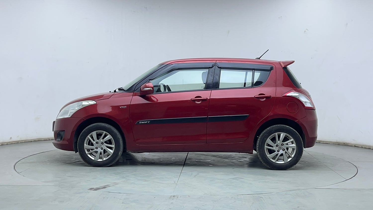 Used 2014 Maruti Suzuki Swift ZXi Petrol Manual exterior LEFT SIDE VIEW