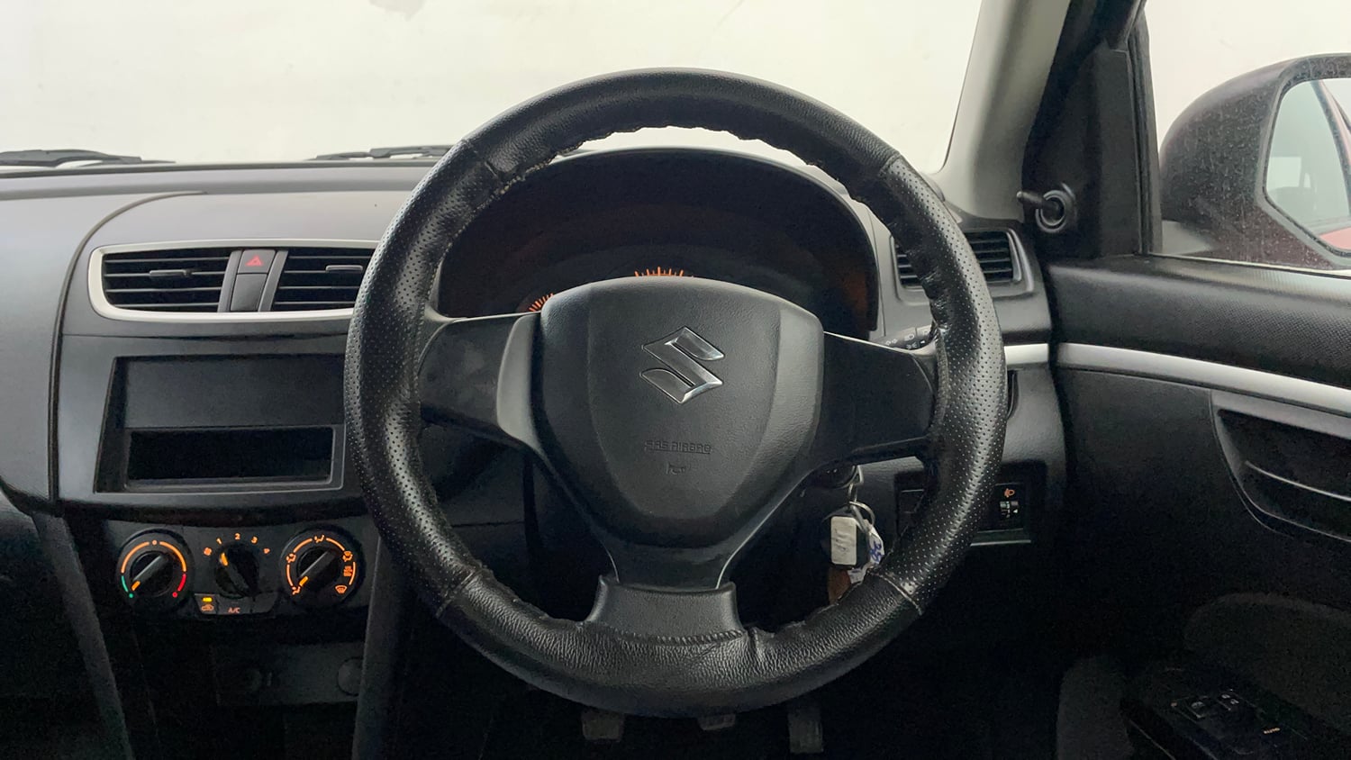 Used 2017 Maruti Suzuki Swift Lxi ABS (O) Petrol Manual interior STEERING VIEW
