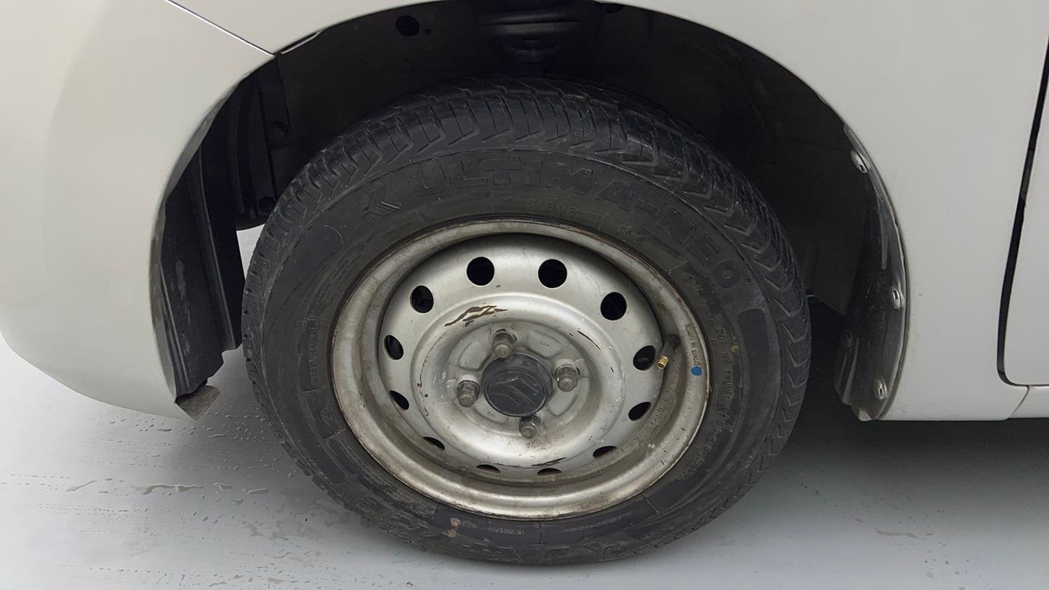Used 2013 Maruti Suzuki Wagon R LXI Petrol Manual tyres LEFT FRONT TYRE RIM VIEW