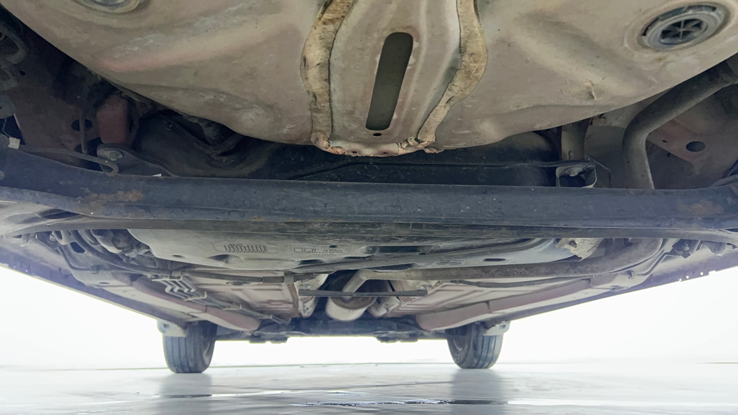 Used 2021 Maruti Suzuki Baleno Sigma Petrol Manual extra REAR UNDERBODY VIEW (TAKEN FROM REAR)