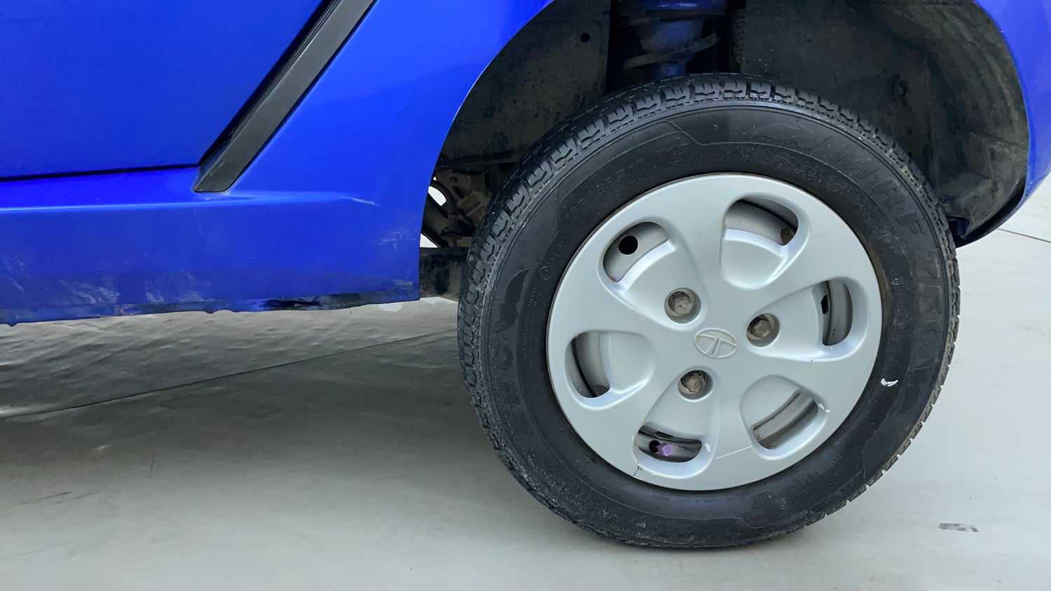 Used 2016 Tata Nano Twist XTA Petrol Automatic tyres LEFT REAR TYRE RIM VIEW