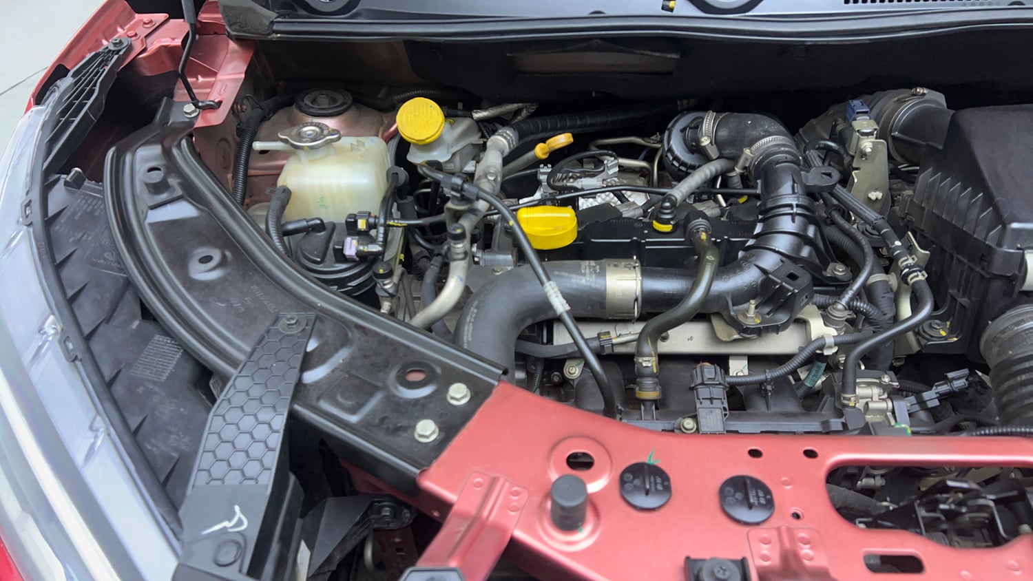 Used 2024 Nissan Magnite XV Premium Turbo CVT Dual Tone Petrol Automatic engine ENGINE RIGHT SIDE VIEW