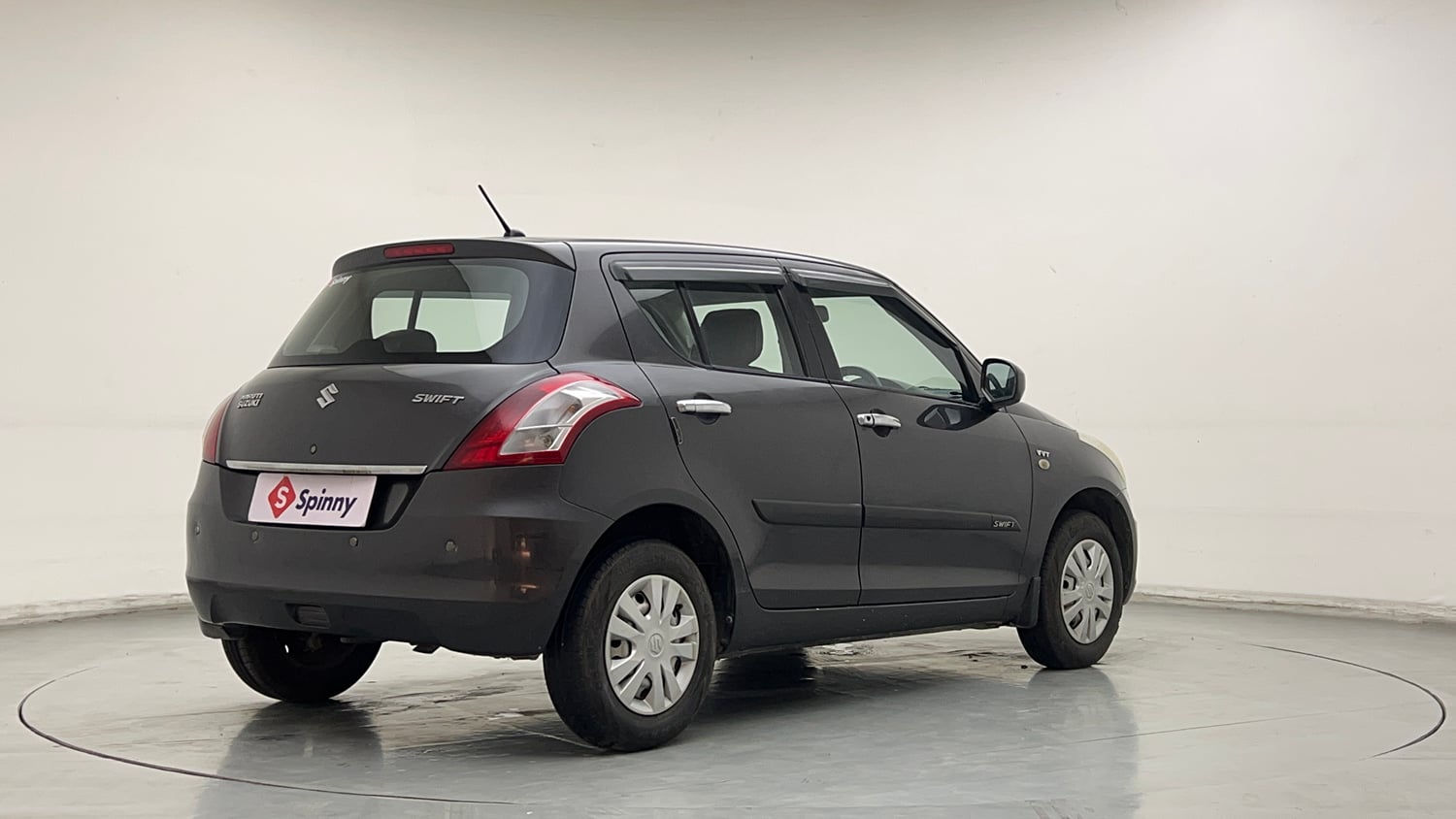 Used 2017 Maruti Suzuki Swift Lxi (O) Petrol Manual exterior RIGHT REAR CORNER VIEW