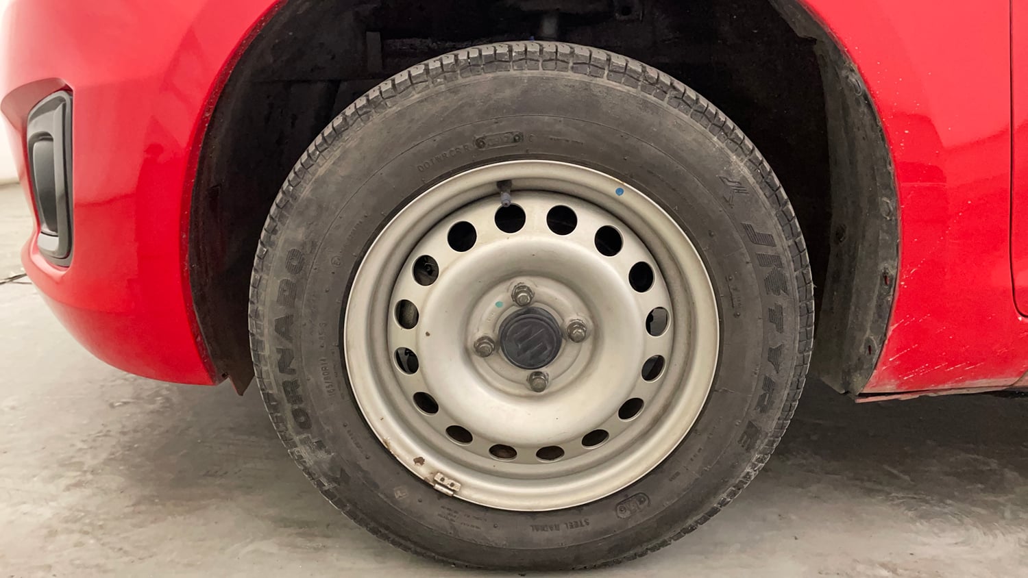 Used 2017 Maruti Suzuki Swift Lxi ABS (O) Petrol Manual tyres LEFT FRONT TYRE RIM VIEW