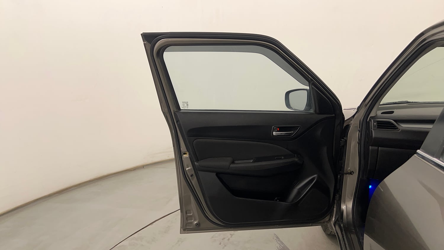 Used 2021 Maruti Suzuki Swift VXi Petrol Manual interior LEFT FRONT DOOR OPEN VIEW