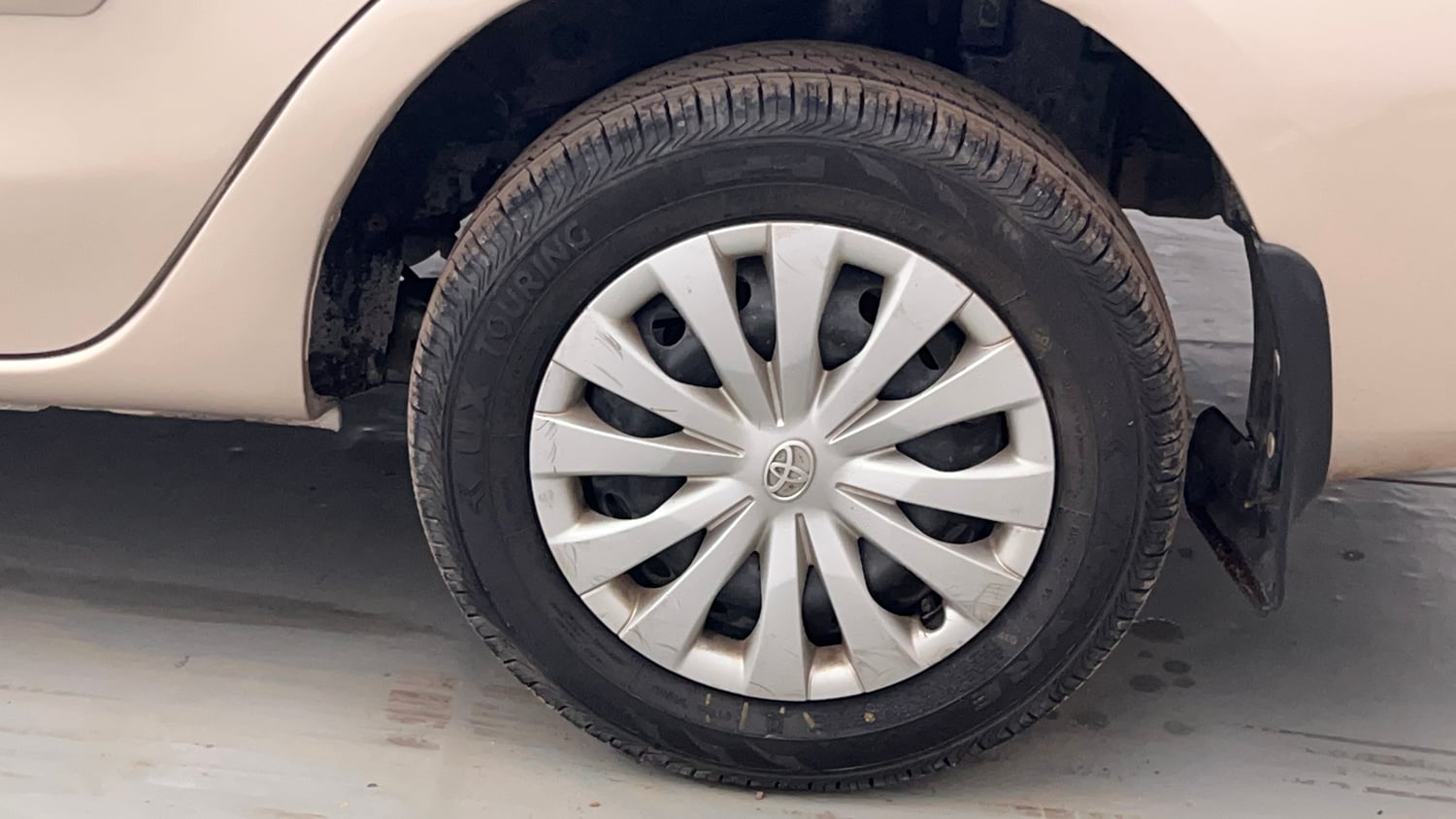 Used 2013 Toyota Etios G Petrol Manual tyres LEFT REAR TYRE RIM VIEW