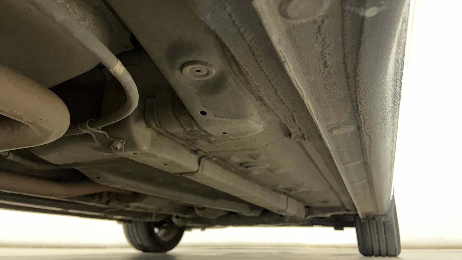 Used 2024 Hyundai Verna SX 1.5 Petrol MT Petrol Manual extra REAR RIGHT UNDERBODY VIEW