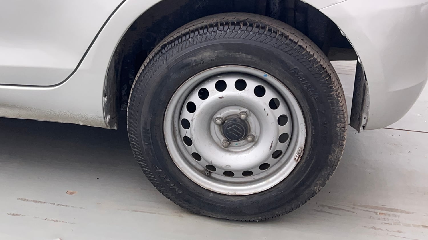 Used 2017 Maruti Suzuki Swift Lxi (O) Petrol Manual tyres LEFT REAR TYRE RIM VIEW