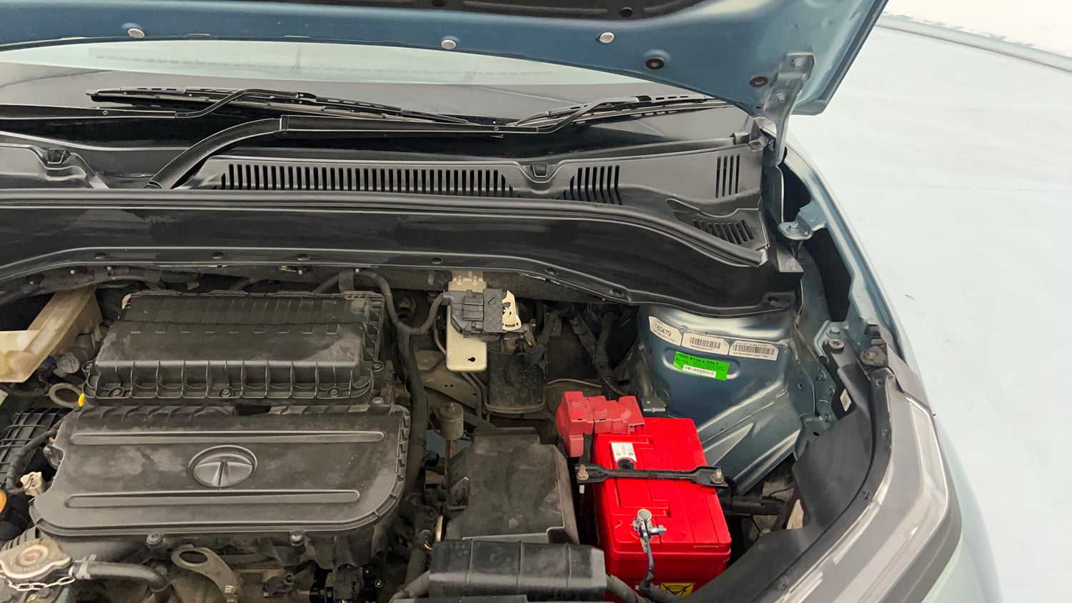 Used 2022 Tata Punch Adventure MT Petrol Manual engine ENGINE LEFT SIDE HINGE & APRON VIEW