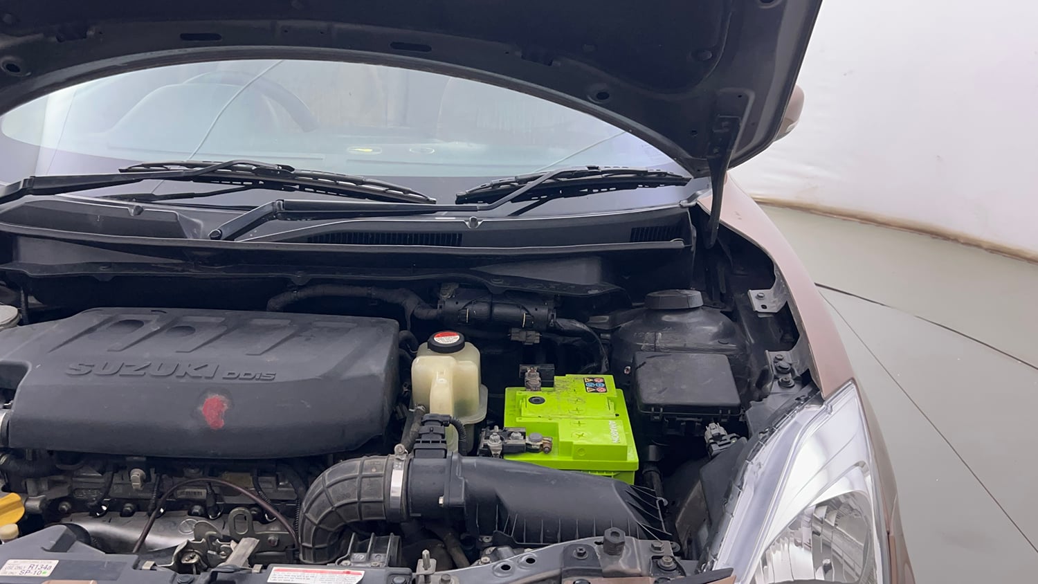 Used 2019 Maruti Suzuki Dzire VDi Diesel Manual engine ENGINE LEFT SIDE HINGE & APRON VIEW
