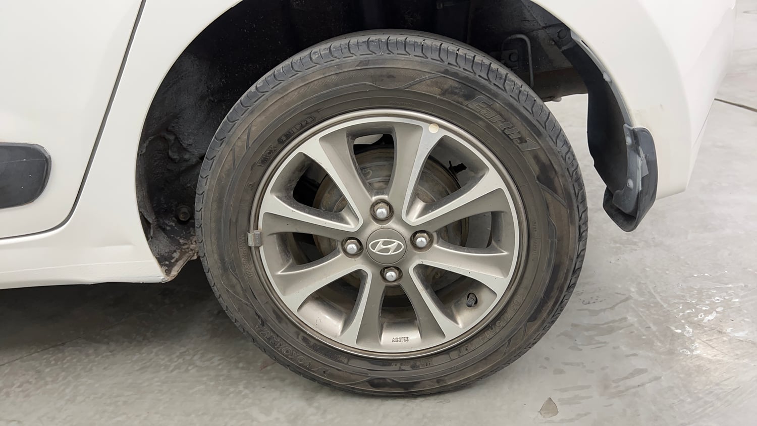 Used 2014 Hyundai Grand i10 Asta 1.2 Kappa VTVT (O) Petrol Manual tyres LEFT REAR TYRE RIM VIEW