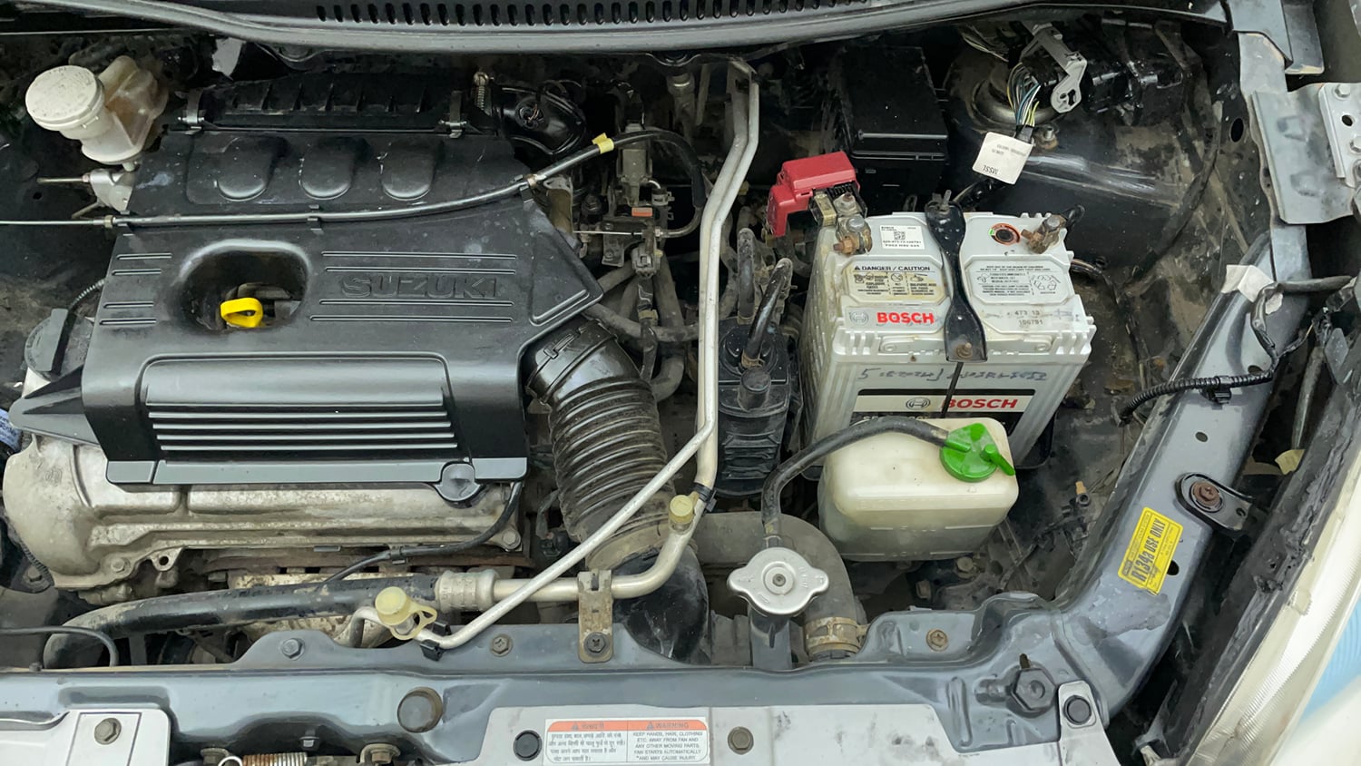 Used 2014 Maruti Suzuki Wagon R VXI Petrol Manual engine ENGINE LEFT SIDE VIEW
