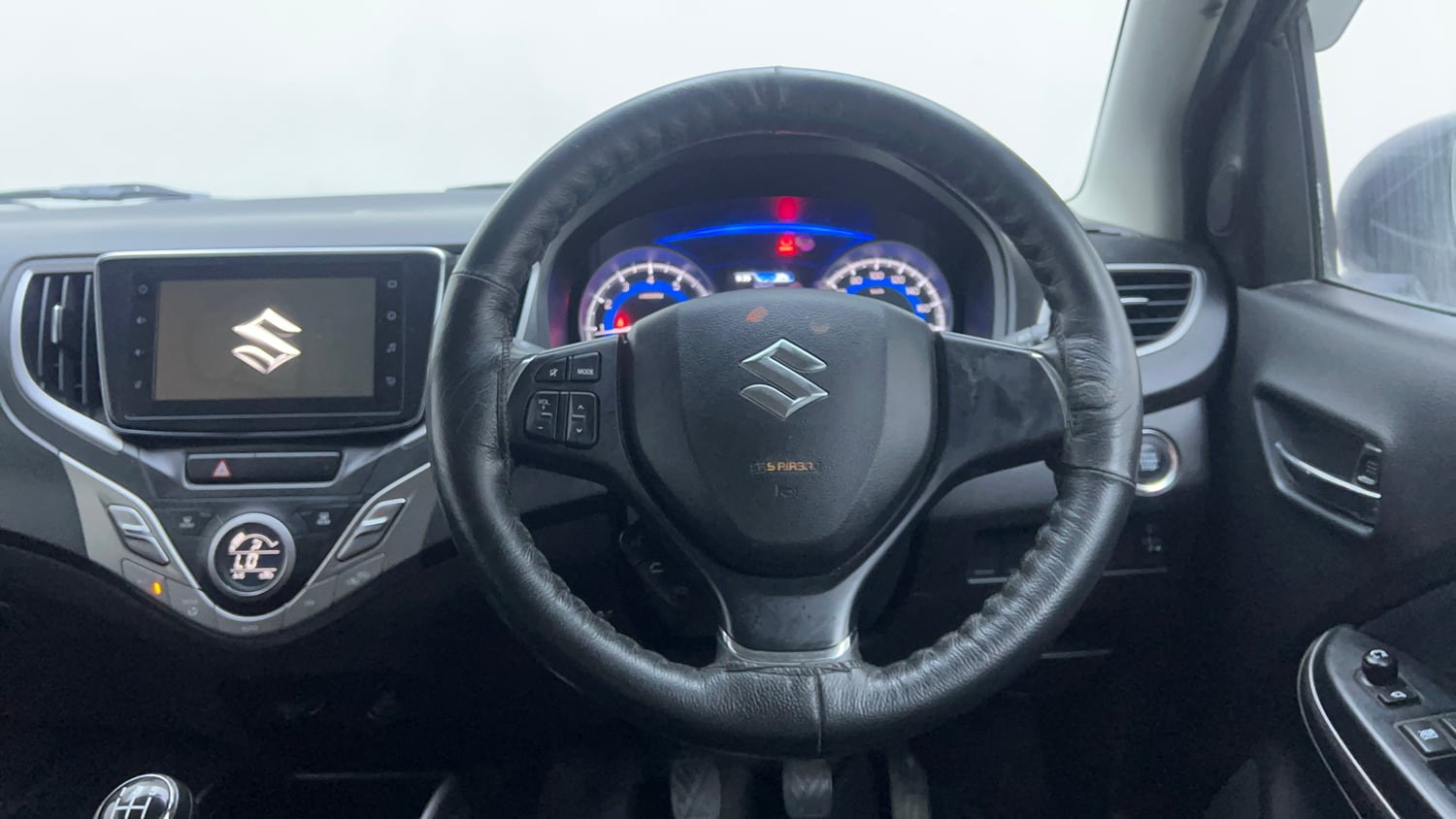 Used 2021 Maruti Suzuki Baleno Zeta Petrol Manual interior STEERING VIEW