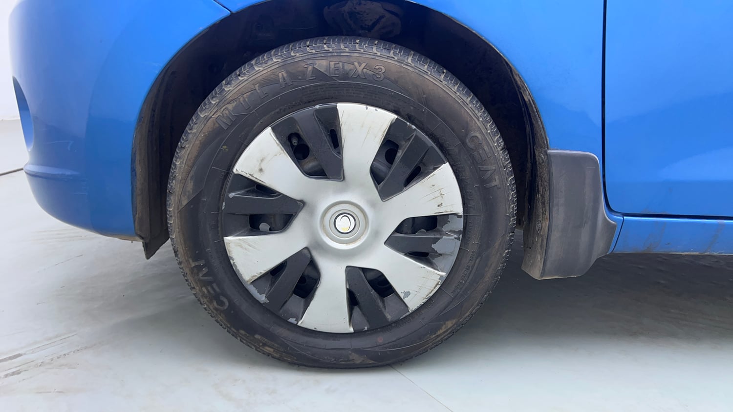 Used 2015 Maruti Suzuki Celerio VXi AMT Petrol Automatic tyres LEFT FRONT TYRE RIM VIEW