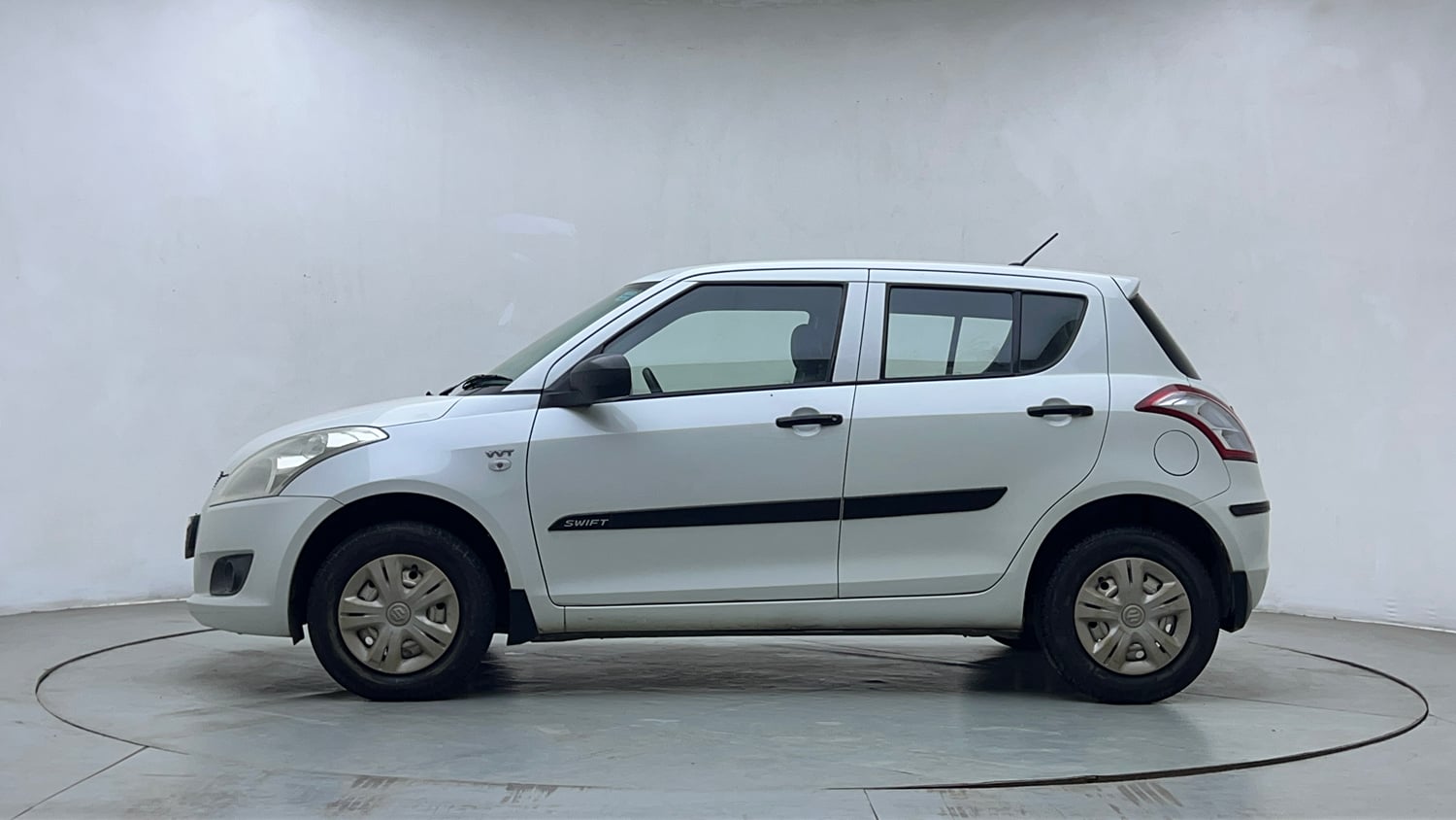 Used 2013 Maruti Suzuki Swift LXi Petrol Manual exterior LEFT SIDE VIEW