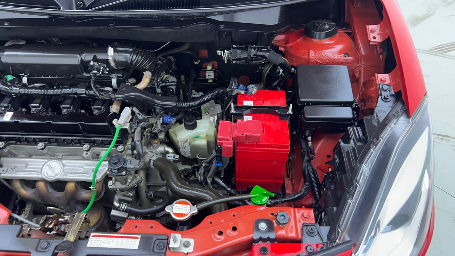 Used 2023 Maruti Suzuki Swift ZXi Plus AMT Dual Tone Petrol Automatic engine ENGINE LEFT SIDE VIEW