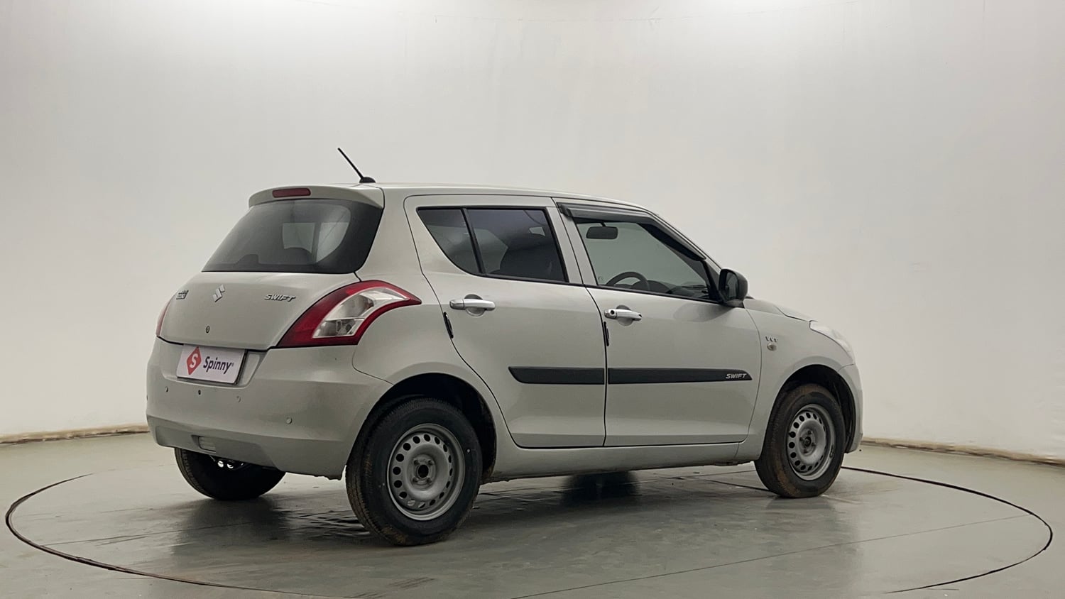 Used 2017 Maruti Suzuki Swift Lxi (O) Petrol Manual exterior RIGHT REAR CORNER VIEW