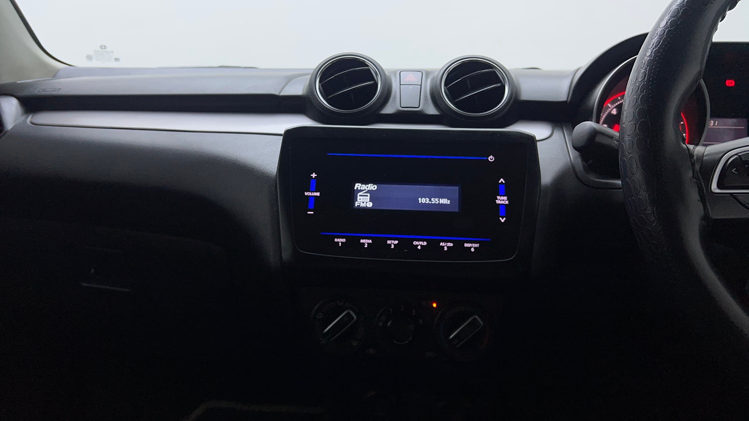 Used 2022 Maruti Suzuki Swift VXi Petrol Manual top_features Integrated (in-dash) music system