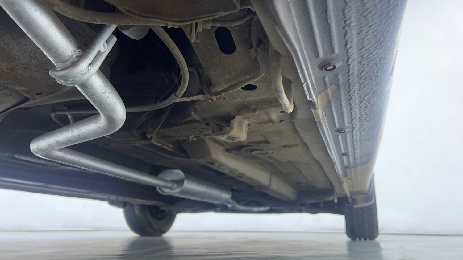 Used 2015 Maruti Suzuki Celerio VXi AMT Petrol Automatic extra REAR RIGHT UNDERBODY VIEW