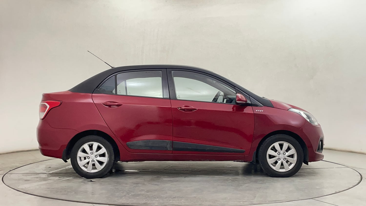 Used 2014 Hyundai Xcent S 1.2 (O) Petrol Manual exterior RIGHT SIDE VIEW