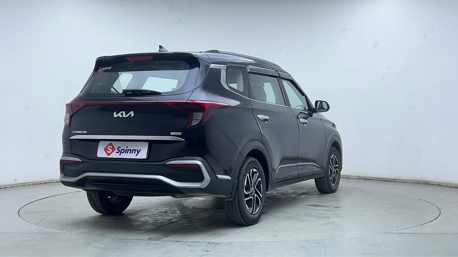 Used 2022 Kia Carens Prestige Plus 1.4 Petrol MT 7 STR Petrol Manual exterior RIGHT REAR CORNER VIEW