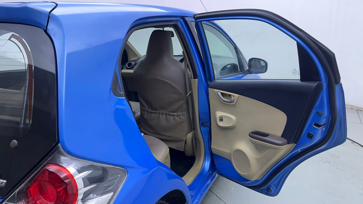 Used 2013 Honda Brio V MT Petrol Manual interior RIGHT REAR DOOR OPEN VIEW