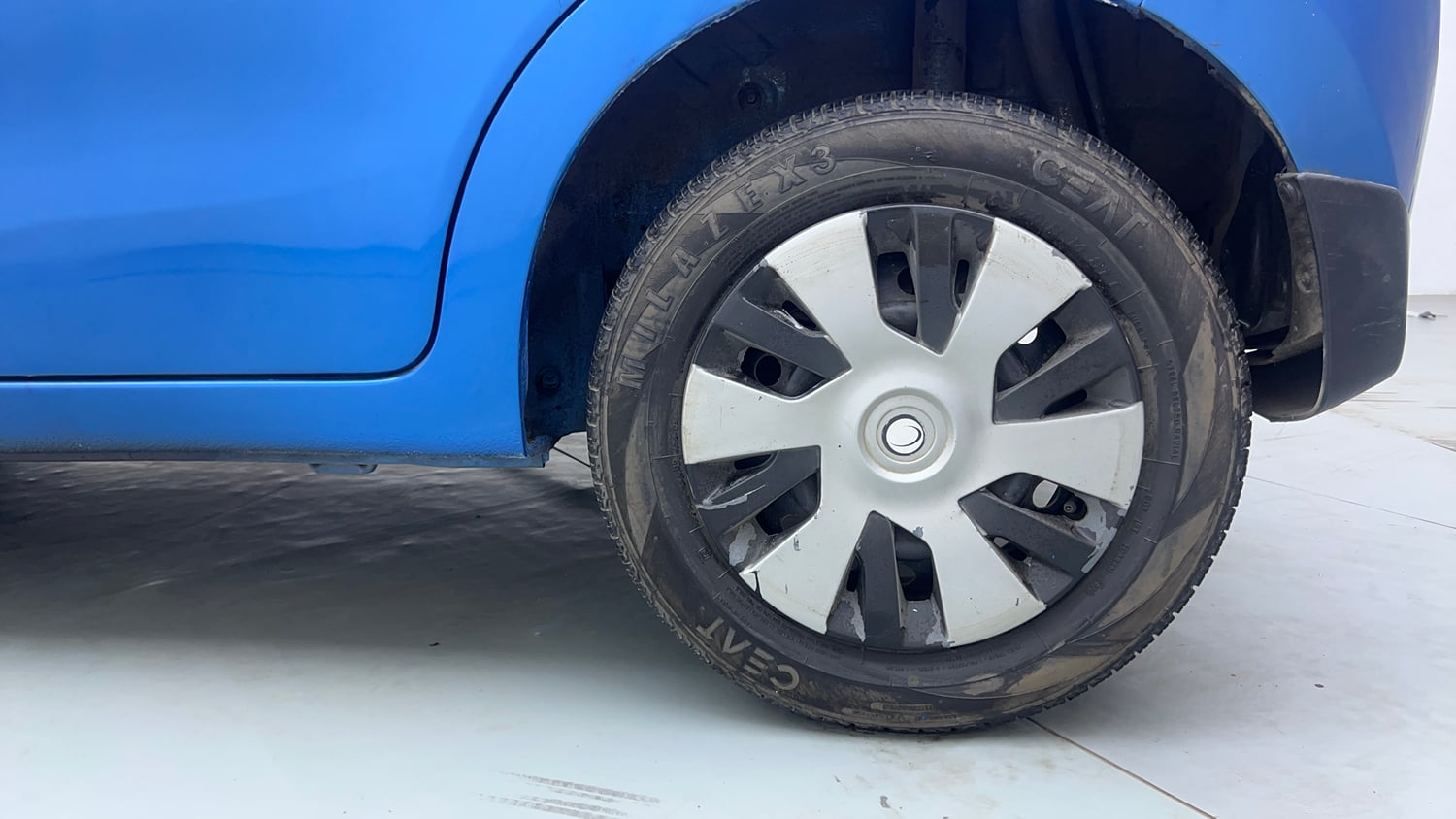 Used 2015 Maruti Suzuki Celerio VXi AMT Petrol Automatic tyres LEFT REAR TYRE RIM VIEW