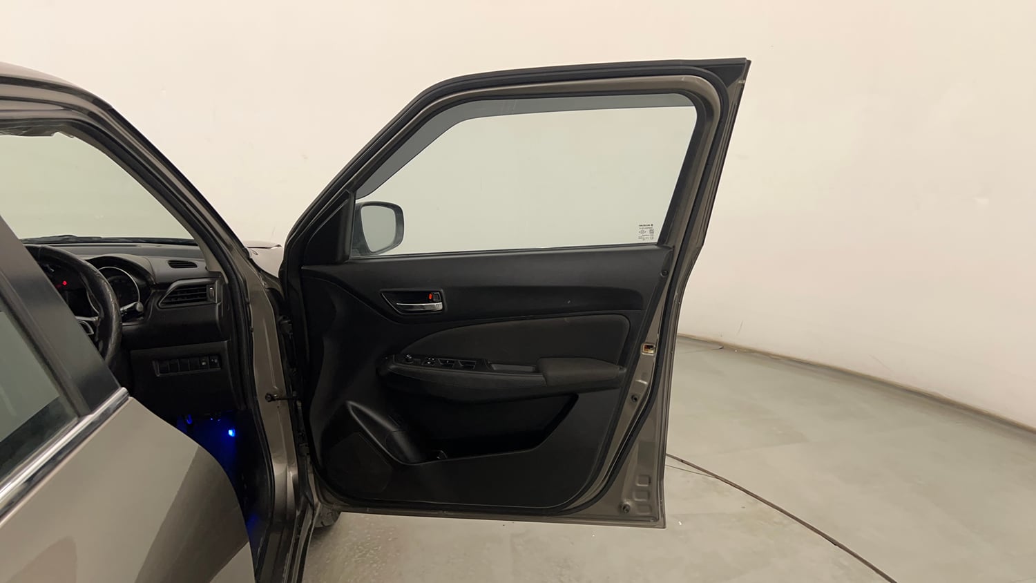 Used 2021 Maruti Suzuki Swift VXi Petrol Manual interior RIGHT FRONT DOOR OPEN VIEW