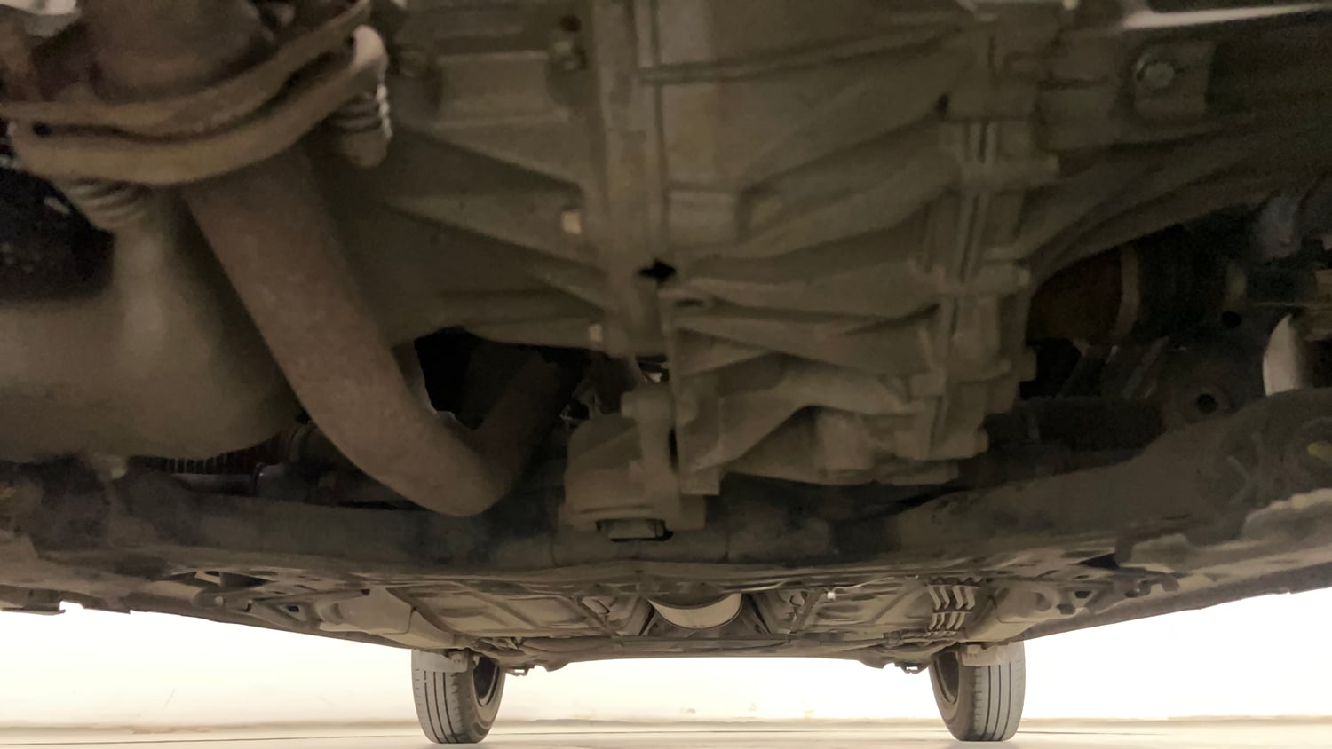 Used 2020 Maruti Suzuki Swift VXi AMT Petrol Automatic extra FRONT LEFT UNDERBODY VIEW