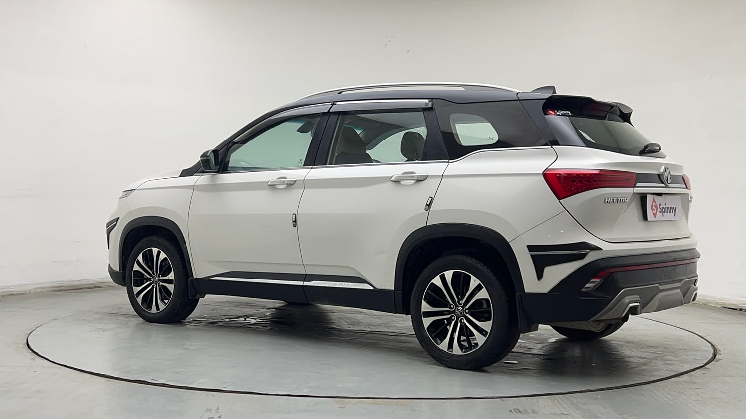 Used 2023 MG Motors Hector 1.5 Sharp CVT Dual Tone Petrol Automatic exterior LEFT REAR CORNER VIEW
