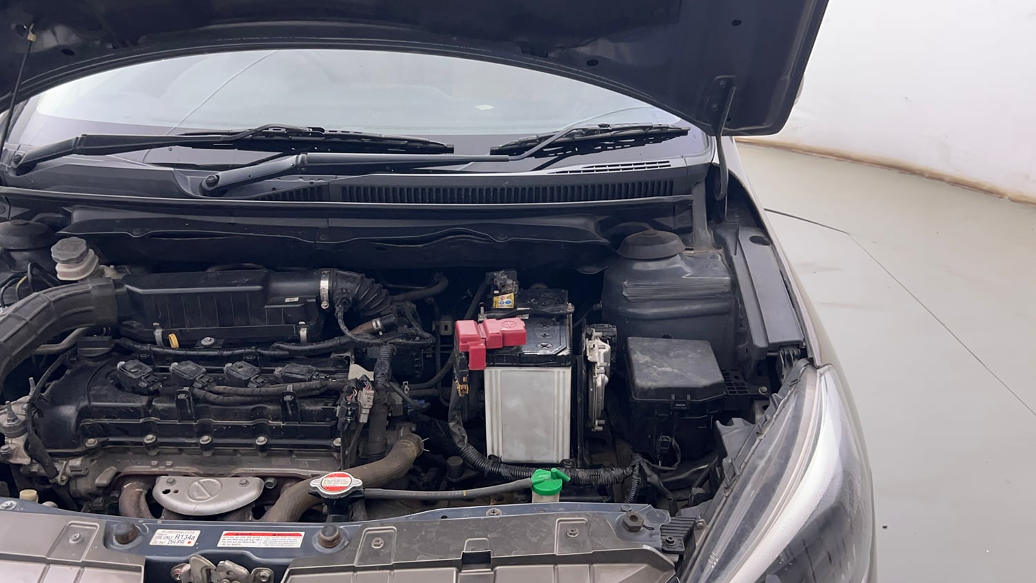Used 2021 Maruti Suzuki Ciaz Alpha 1.5 Petrol Manual engine ENGINE LEFT SIDE HINGE & APRON VIEW