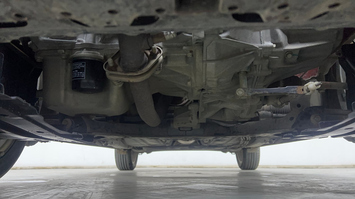 Used 2021 Maruti Suzuki Baleno Zeta Petrol Manual extra FRONT LEFT UNDERBODY VIEW
