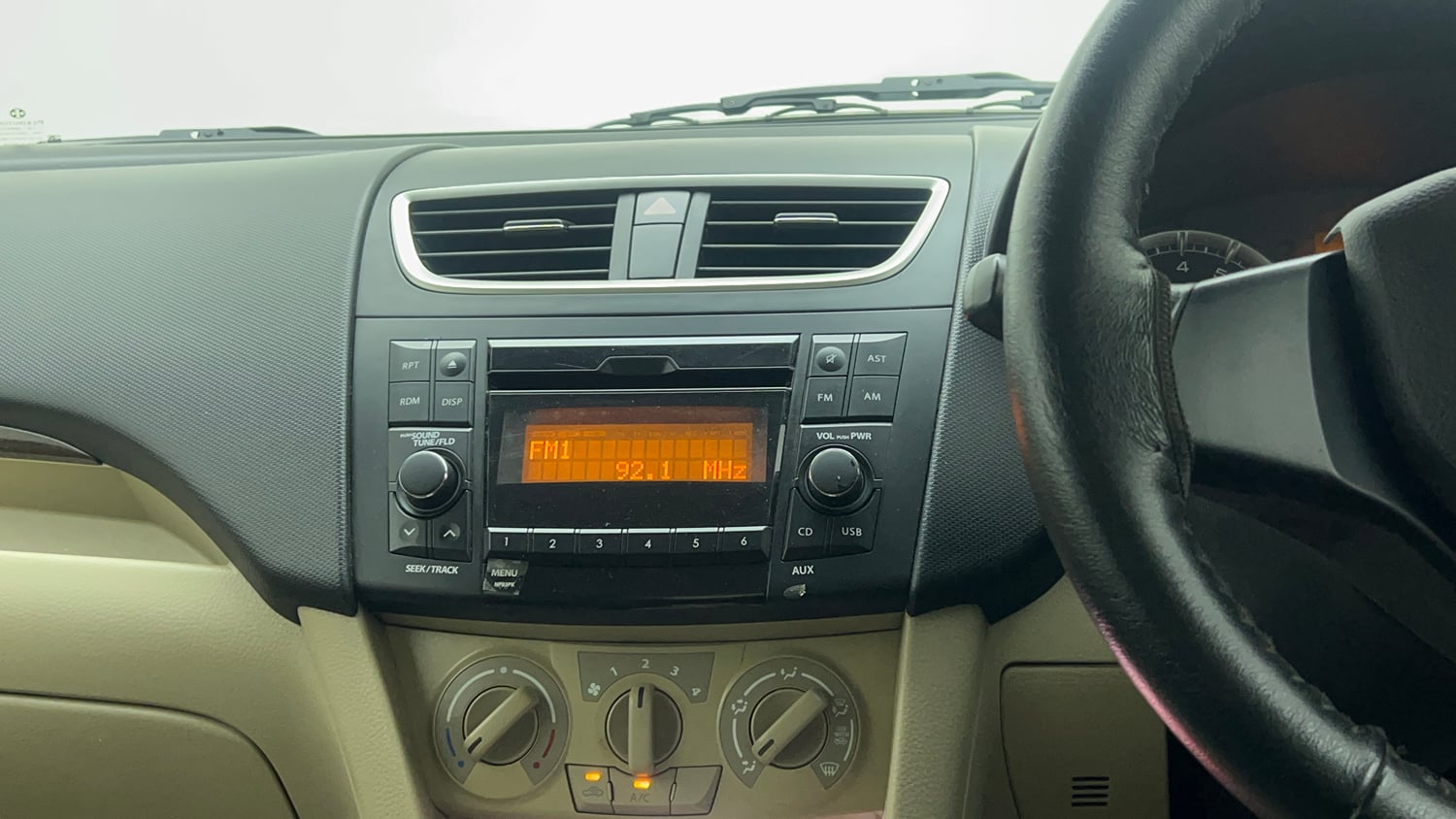 Used 2017 Maruti Suzuki Swift Dzire VXI Petrol Manual top_features Integrated (in-dash) music system
