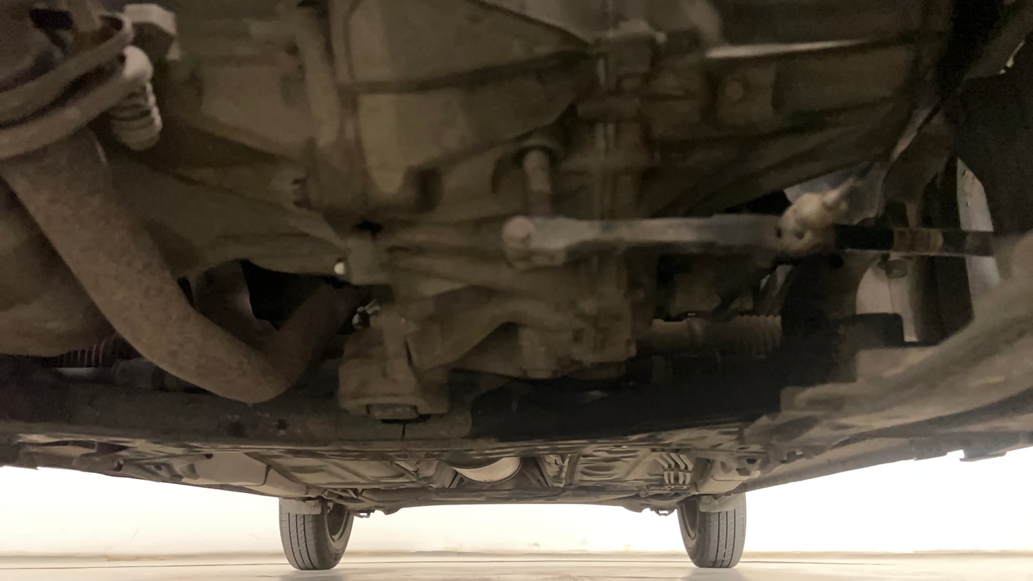 Used 2021 Maruti Suzuki Swift VXi Petrol Manual extra FRONT LEFT UNDERBODY VIEW